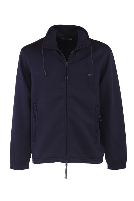 Shop EMPORIO ARMANI  Sweatshirt: Emporio Armani full zip sweatshirt in double jersey Travel Essential.
Double jersey.
High collar with drawstring.
Long sleeves.
Elastic cuffs.
Side pockets with zip.
Bottom with drawstring and tie rods.
Collector's patch on the back.
Regular fit.
Composition 48% Polyester, 46% Modal 6%, Elastane.
Made in Cambodia.. EM000083 AF10103-UB118